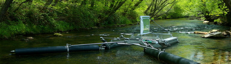 Storm Water Systems Bandalong litter trap installed in a waterway