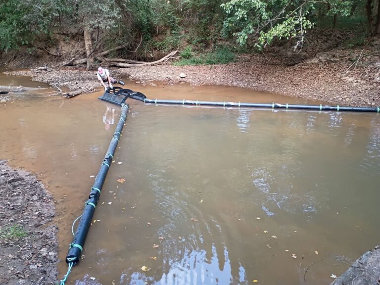 Trash weir in Canton Creek
