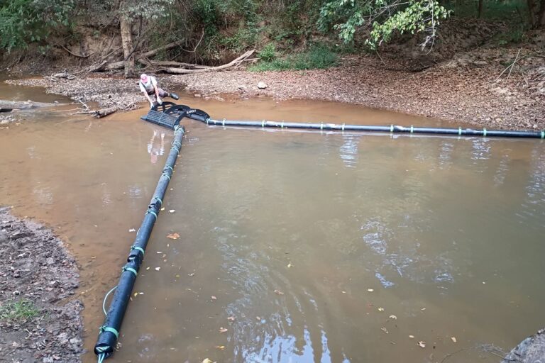 Trash weir in Canton Creek